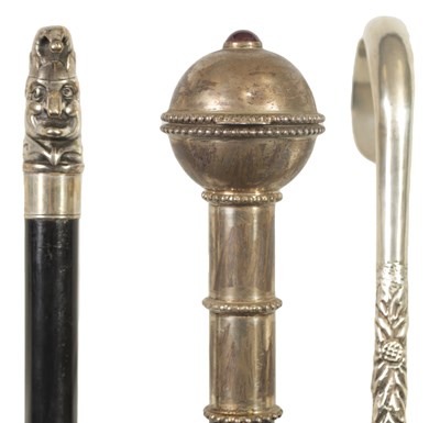 Lot 482 - TWO LATE 19TH CENTURY EBONISED WALKING CANES WITH SILVER PLATED MOUNTS