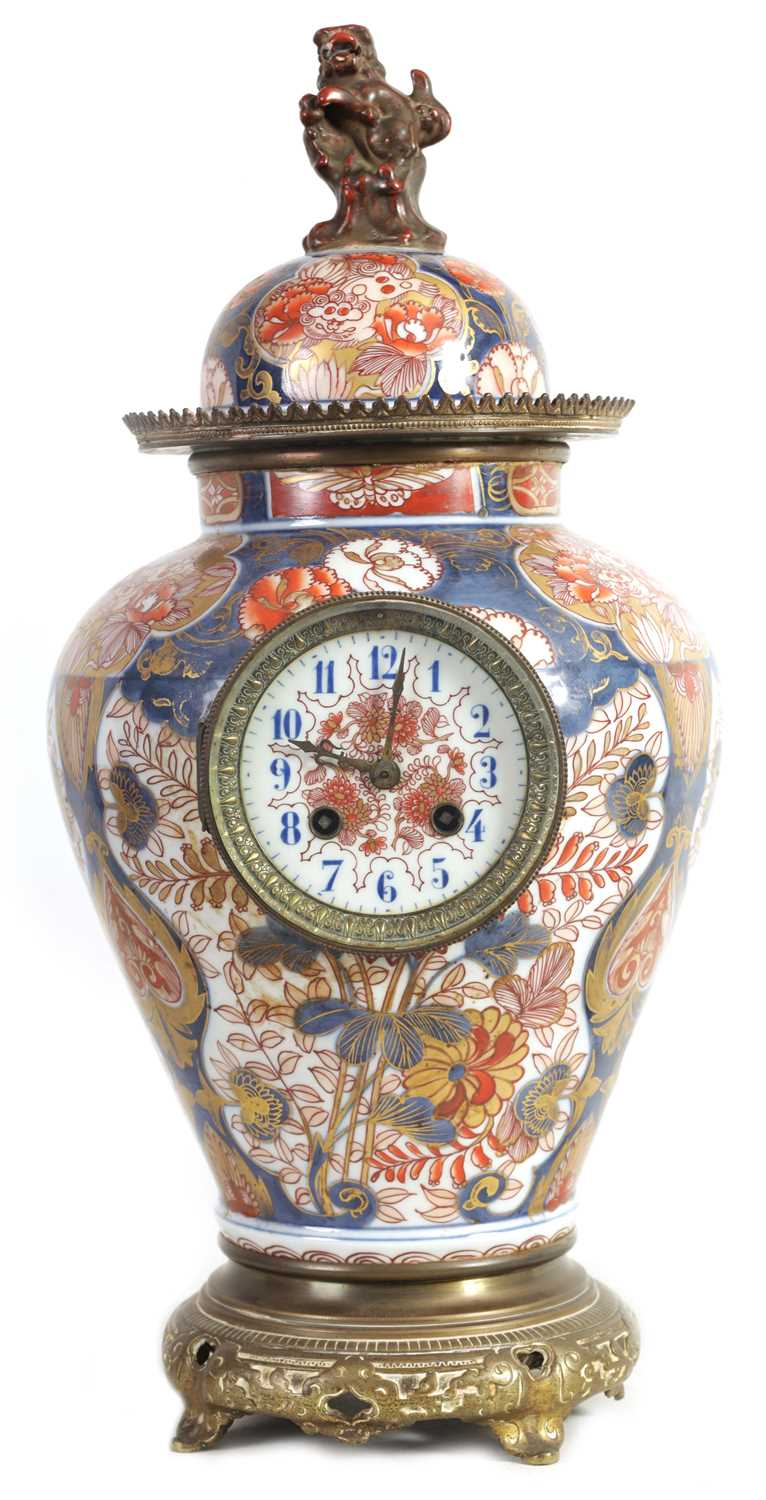 Lot 718 - A 19TH CENTURY IMARI VASE CLOCK