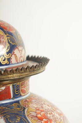 Lot 718 - A 19TH CENTURY IMARI VASE CLOCK