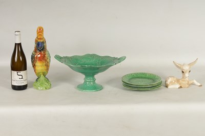 Lot 75 - FIVE 19TH CENTURY WEDGWOOD GREEN LEAF MOULDED PLATES, A SIMALR LARGE TWO HANDLED FOOTED TAZZA, A ST CLEMENT FRANCE PARROT JUG AND A POTTERY BAMBI FIGURE