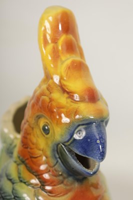 Lot 75 - FIVE 19TH CENTURY WEDGWOOD GREEN LEAF MOULDED PLATES, A SIMALR LARGE TWO HANDLED FOOTED TAZZA, A ST CLEMENT FRANCE PARROT JUG AND A POTTERY BAMBI FIGURE