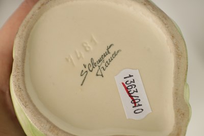 Lot 75 - FIVE 19TH CENTURY WEDGWOOD GREEN LEAF MOULDED PLATES, A SIMALR LARGE TWO HANDLED FOOTED TAZZA, A ST CLEMENT FRANCE PARROT JUG AND A POTTERY BAMBI FIGURE