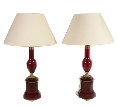 Lot 501 - A PAIR OF FRENCH 19TH CENTURY STYLE RUBY GLASS AND GILT BRASS TABLE LAMPS
