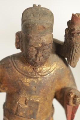 Lot 185 - A CHINESE MING PERIOD CARVED WOODEN FIGURE OF AN IMMORTAL