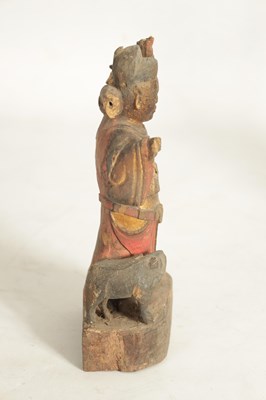 Lot 185 - A CHINESE MING PERIOD CARVED WOODEN FIGURE OF AN IMMORTAL