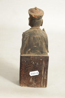 Lot 173 - A CHINESE MING PERIOD CARVED WOODEN FIGURE OF AN IMMORTAL