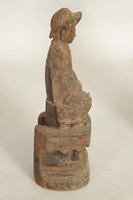 Lot 108 - A CHINESE MING PERIOD CARVED WOODEN FIGURE OF AN IMMORTAL