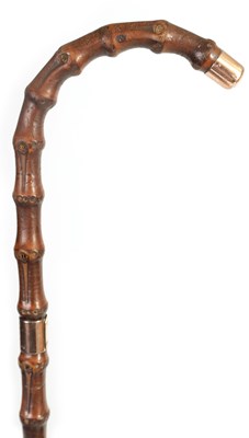 Lot 462 - A LATE 19TH CENTURY 9CT GOLD TIPPED BAMBOO WALKING STICK BY BRIGG