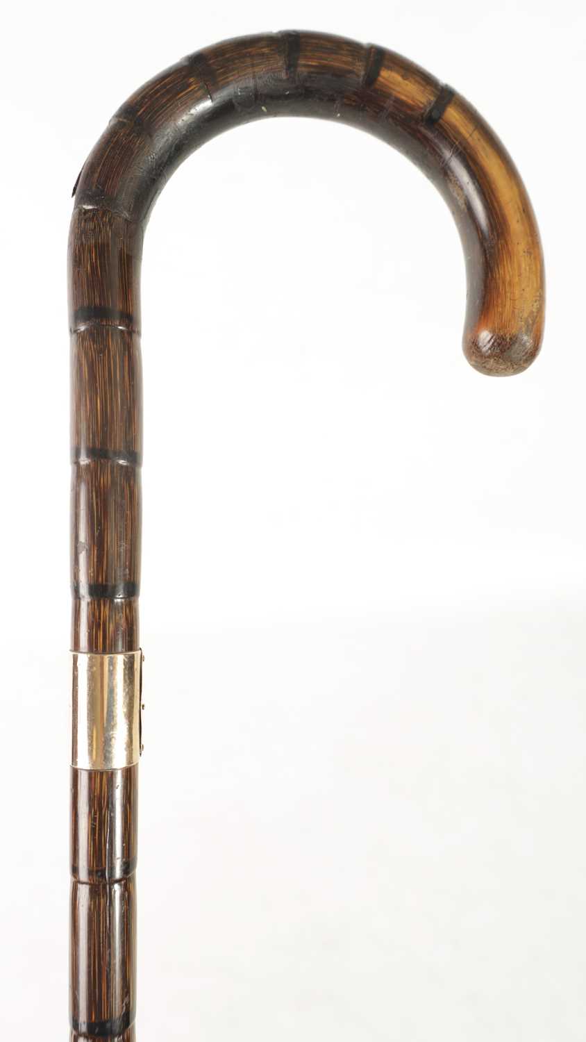 Lot 488 - A LATE 19TH CENTURY PALM WOOD WLKING STICK