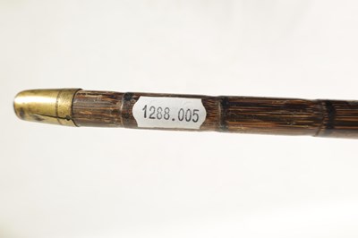 Lot 488 - A LATE 19TH CENTURY PALM WOOD WLKING STICK