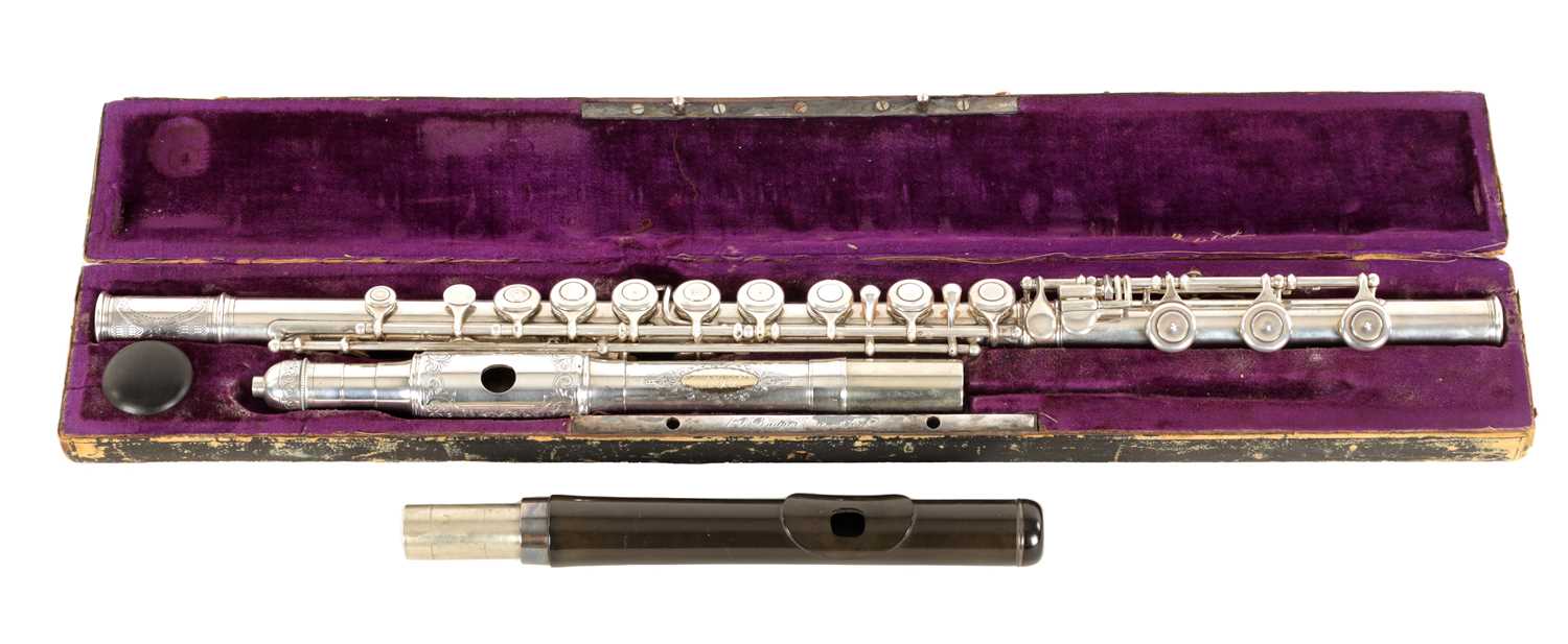 Lot 730 - ALFRED G BADGER, NEW YORK. A SOLID SILVER FLUTE WITH GOLD NAME-PLATE