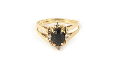 Lot 355 - A LADIES 9CT GOLD SAPPHIRE AND DIAMOND REVERSIBLE RING