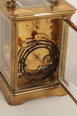 Lot 1062 - A MATTHEW NORMAN BRASS STRIKING CARRIAGE CLOCK