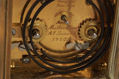 Lot 1062 - A MATTHEW NORMAN BRASS STRIKING CARRIAGE CLOCK