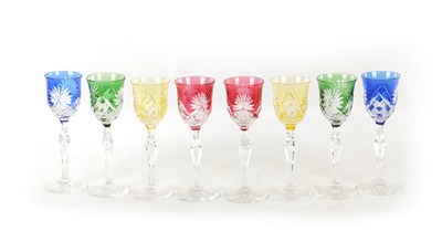 Lot 2 - A SET OF EIGHT 20TH CENTURY COLOURED CUT GLASS WINE GLASSES