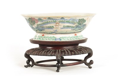 Lot 168 - A 19TH CENTURY CHINESE PORCELAIN DISH ON HARDWOOD STAND