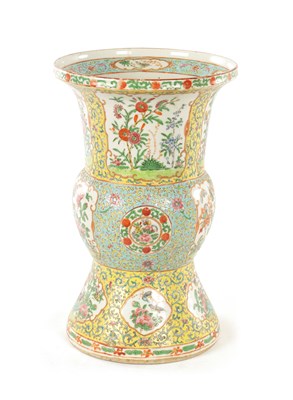 Lot 286 - A CHINESE QING DYNASTY YELLOW GROUND FAMILLE ROSE VASE