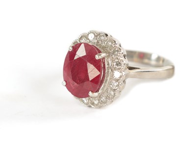 Lot 363 - A LADIES 18CT GOLD 4CT RUBY AND DIAMOND RING