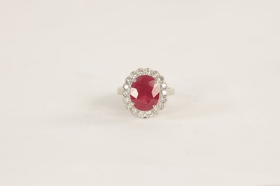 Lot 363 - A LADIES 18CT GOLD 4CT RUBY AND DIAMOND RING