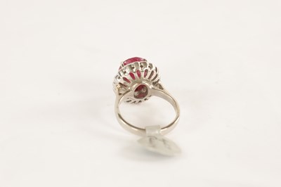 Lot 363 - A LADIES 18CT GOLD 4CT RUBY AND DIAMOND RING