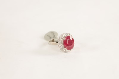 Lot 363 - A LADIES 18CT GOLD 4CT RUBY AND DIAMOND RING