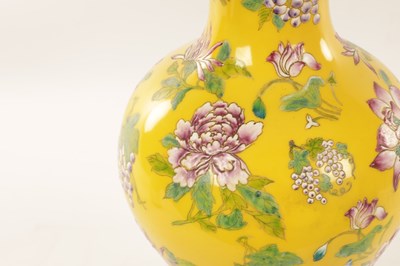 Lot 121 - A CHINESE FAMILLE ROSE YELLOW GROUND VASE