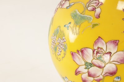 Lot 121 - A CHINESE FAMILLE ROSE YELLOW GROUND VASE