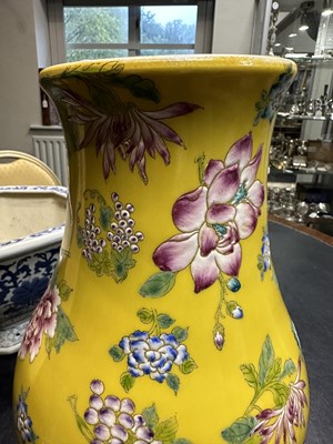 Lot 121 - A CHINESE FAMILLE ROSE YELLOW GROUND VASE