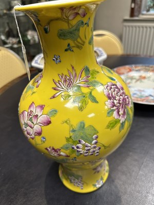 Lot 121 - A CHINESE FAMILLE ROSE YELLOW GROUND VASE