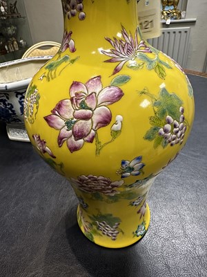 Lot 121 - A CHINESE FAMILLE ROSE YELLOW GROUND VASE