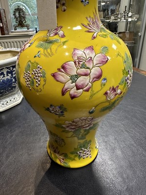 Lot 121 - A CHINESE FAMILLE ROSE YELLOW GROUND VASE