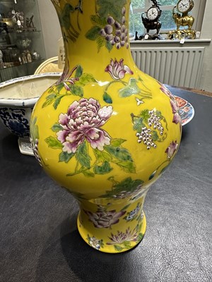 Lot 121 - A CHINESE FAMILLE ROSE YELLOW GROUND VASE