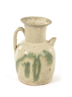 Lot 199 - A CHINESE MING GLAZED EARTHENWARE EWER