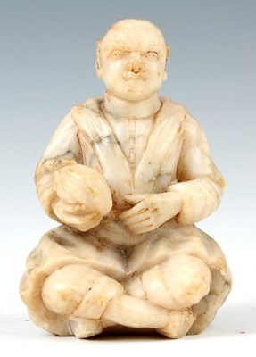 Lot 165 - A CHINESE CARVED ALABASTER FIGURE OF A SEATED...