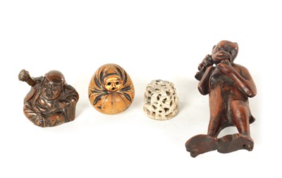 Lot 157 - AN ORIENTAL CARVED WOOD FIGURE, SEATED NETSUKE, SEATED CHINESE BRONZED FIGURE AND ANOTHER SMALL ORIENTAL ITEM