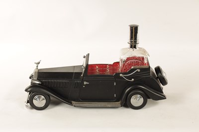 Lot 673 - A 20TH CENTURY BLACK PAINTED NOVELTY MUSICAL ROLLS ROYCE TABLE LIQUEUR DECANTER SET