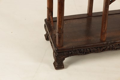 Lot 147 - A 19TH CENTURY CHINESE CHICKEN WING WOOD STANDING WHATNOT