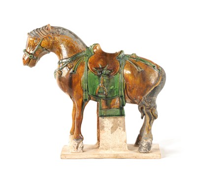 Lot 171 - A 19TH CENTURY CHINESE SANCAI GLAZED TANG HORSE