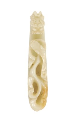 Lot 280 - A CHINESE PALE RUSSET JADE BELT HOOK