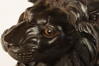 Lot 166 - A JAPANESE MEIJI PERIOD PATINATED BRONZE SCULPTURE OF A LION