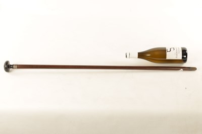 Lot 572 - A 19TH CENTURY CARVED EBONY AND CALAMANDA WALKING CANE