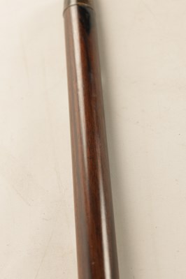 Lot 572 - A 19TH CENTURY CARVED EBONY AND CALAMANDA WALKING CANE