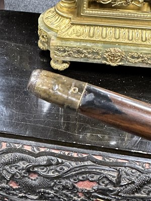 Lot 572 - A 19TH CENTURY CARVED EBONY AND CALAMANDA WALKING CANE