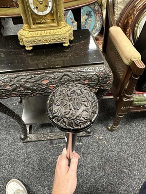 Lot 572 - A 19TH CENTURY CARVED EBONY AND CALAMANDA WALKING CANE
