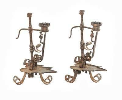 Lot 513 - A PAIR OF ARTS AND CRAFTS IRON WORK RUSHLIGHTS