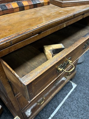 Lot 1302 - A GEORGE I HERRING-BANDED AND FIGURED WALNUT DRESSING CHEST