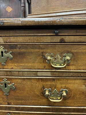 Lot 1302 - A GEORGE I HERRING-BANDED AND FIGURED WALNUT DRESSING CHEST