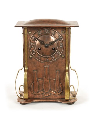 Lot 929 - AN ARTS AND CRAFT COPPER AND BRASS MANTEL CLOCK