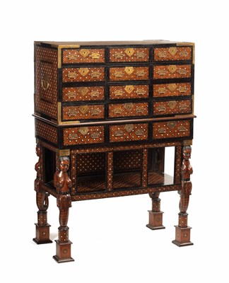 Lot 183 - AN IMPORTANT LATE 17TH CENTURY INDO-PORTUGUESE IVORY INLAID PADOUCK AND EBONY COLLECTORS CABINET ON STAND