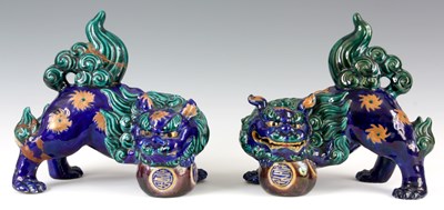 Lot 197 - A PAIR OF 19TH CENTURY CHINESE PORCELAIN FOO...